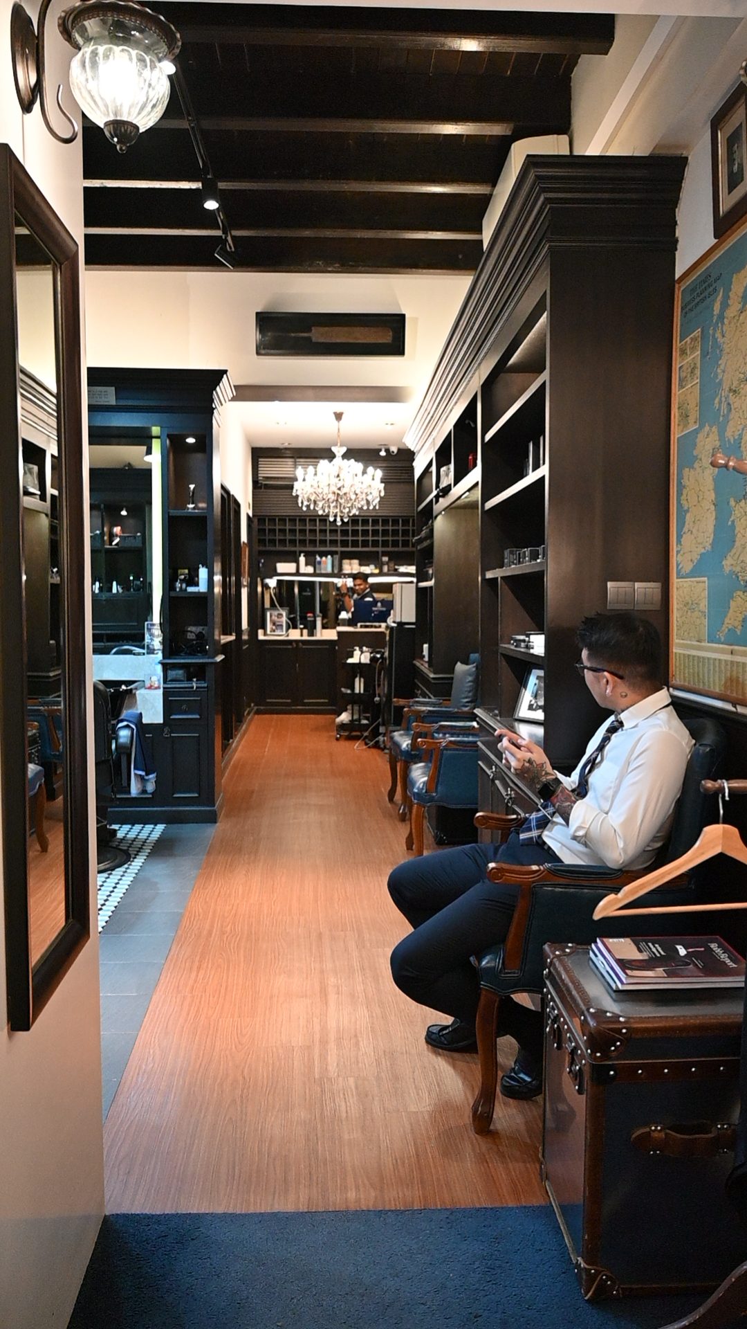 The shophouse corridor, chandelier and waiting chairs
